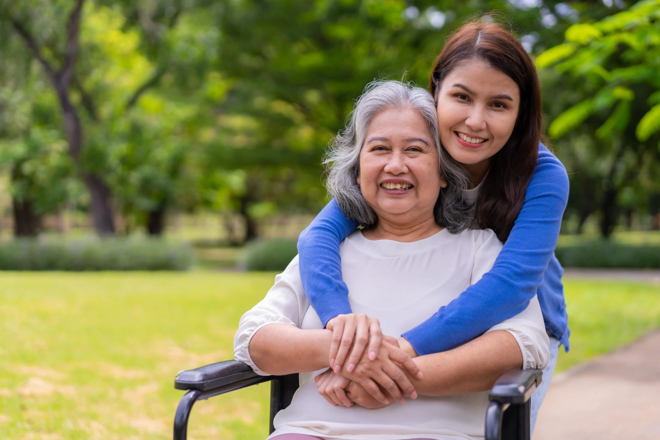care recipient happy with medical chaperone smiling